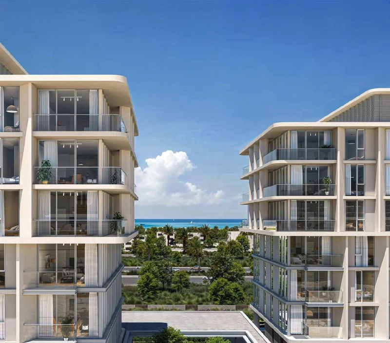 Contemporary residences framing the sea and gardens