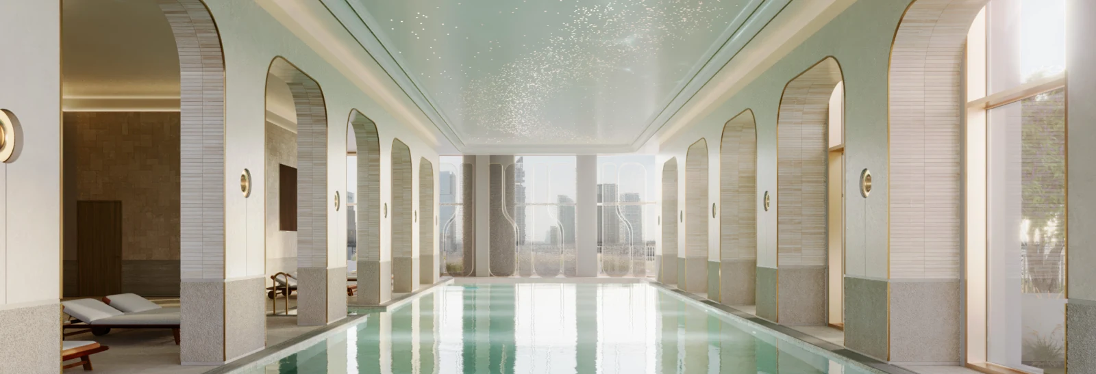 An elegant indoor pool with arched windows